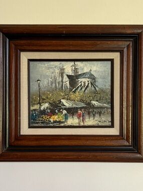 W. Lawton Oil on Board of French Market with Notre Dame in the background.
